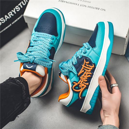 “Men’s graffiti-style thick-soled sports sneakers in teal and orange — Trend Step urban street footwear”