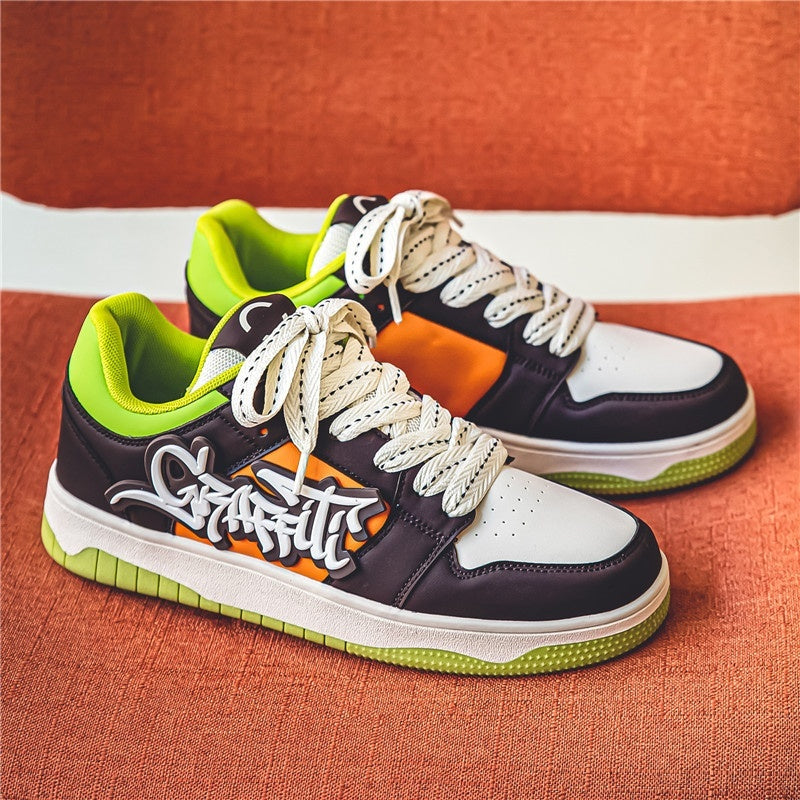 “Men’s graffiti-style thick-soled sports sneakers in teal and orange — Trend Step urban street footwear”