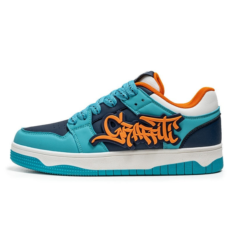 “Men’s graffiti-style thick-soled sports sneakers in teal and orange — Trend Step urban street footwear”