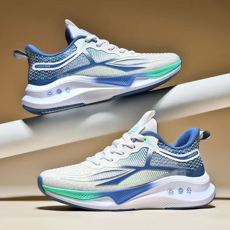 “Men’s ultralight black running sneakers with orange accents, breathable mesh upper, and cushioned soft-bottom sole – Trend Step”