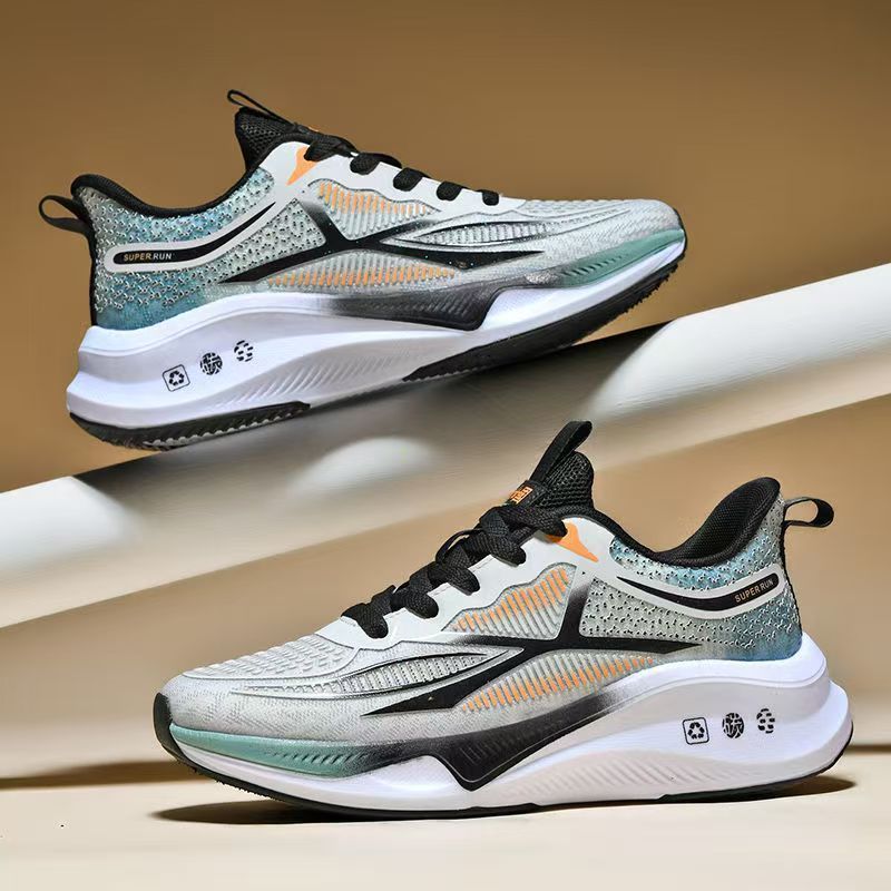 “Men’s ultralight black running sneakers with orange accents, breathable mesh upper, and cushioned soft-bottom sole – Trend Step”