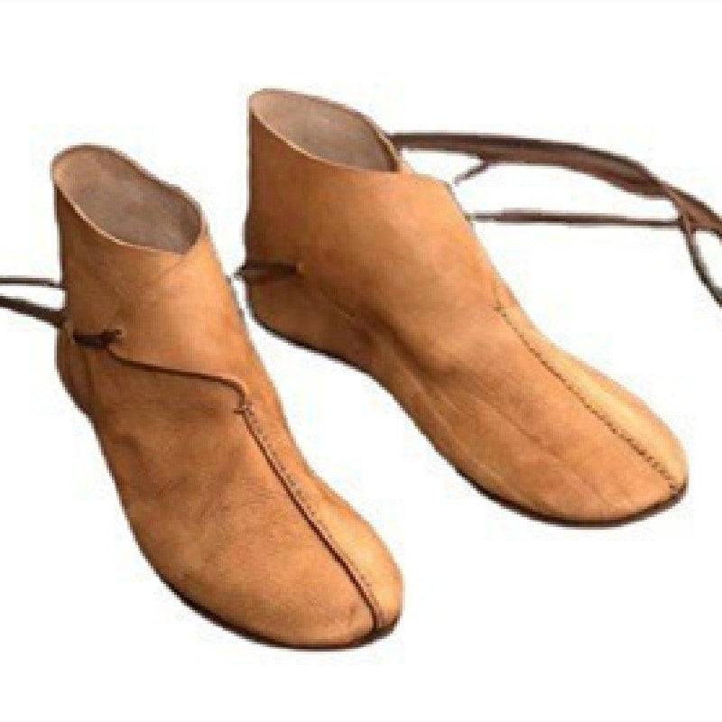 “Vintage men’s brown flat round-toe leather lace-up boots on wooden surface – Trend Step”